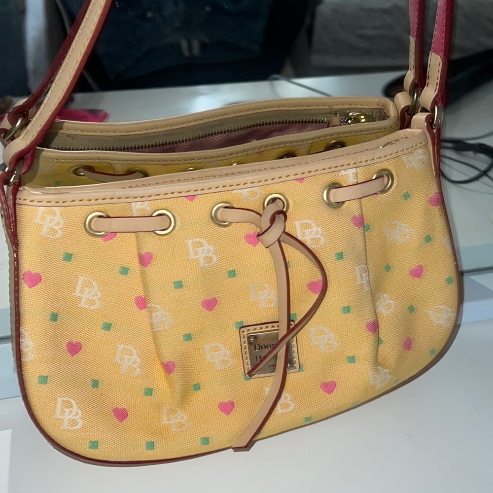 Vintage DOONEY and bourke yellow signature bag